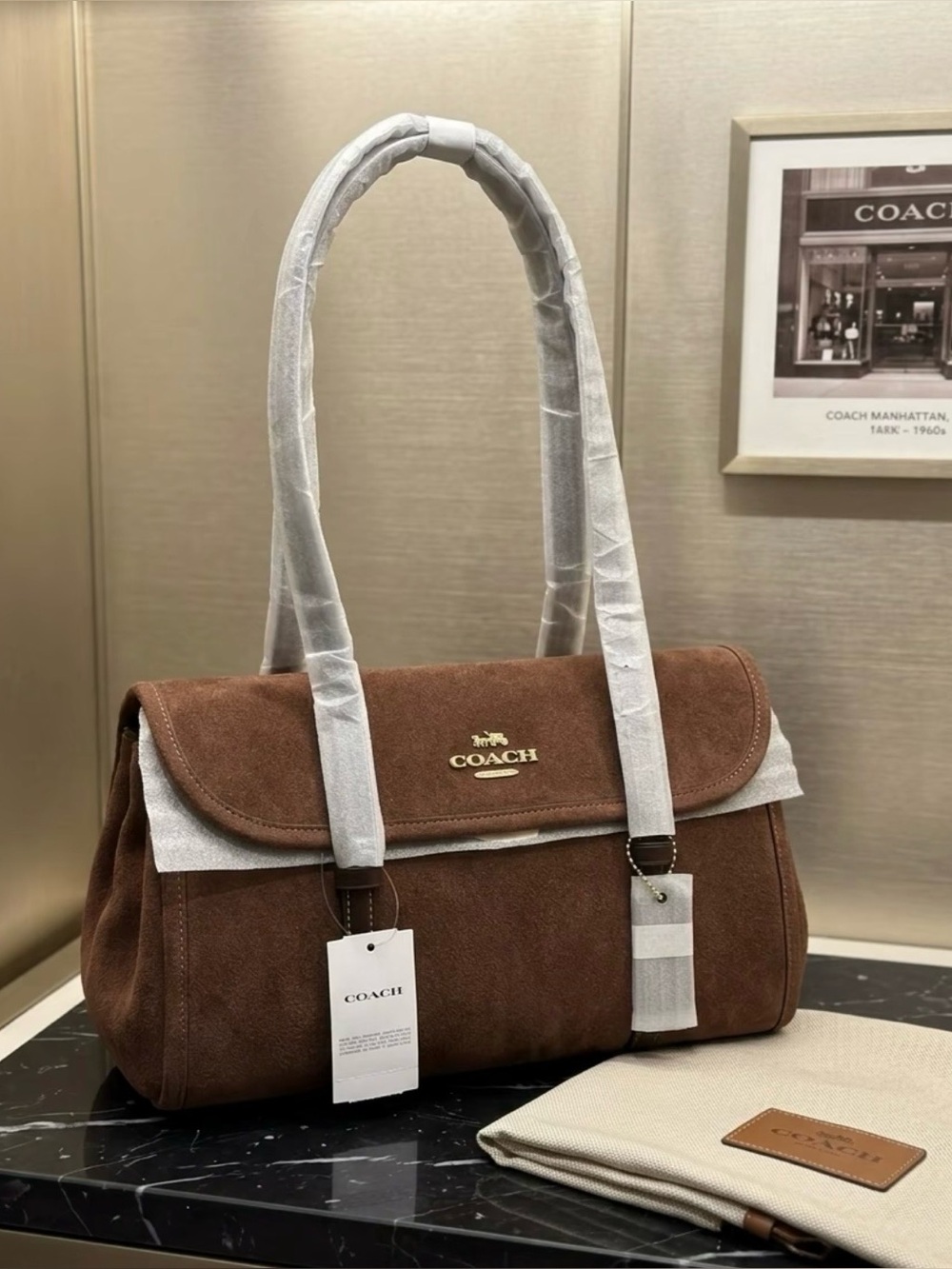 Coach Brown Suede Shoulder Bag with Gold Logo Plaque